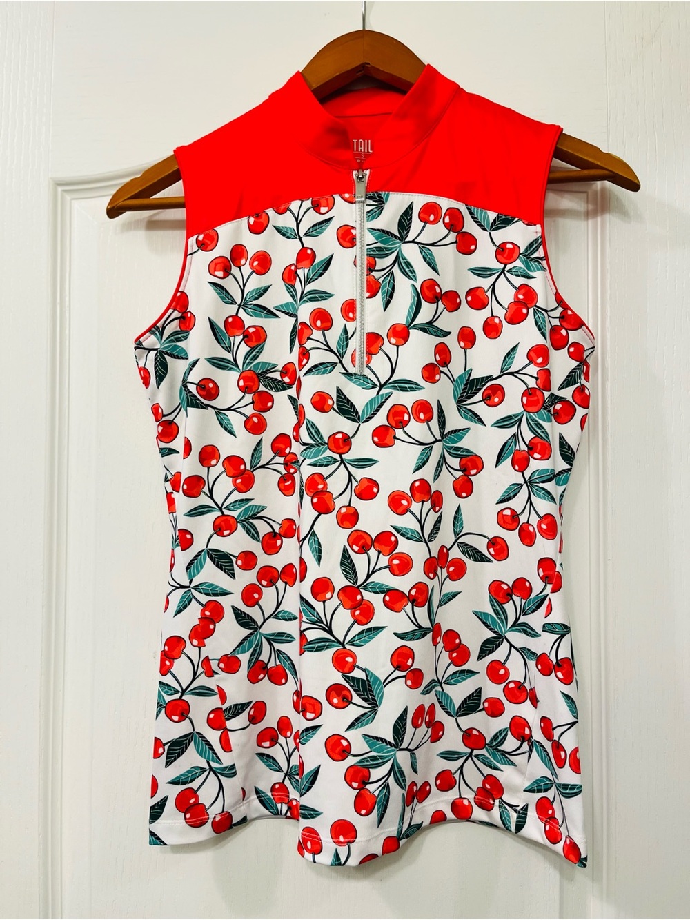 Tail Small Cherry Print Sleeveless Zip-Front Golf Top in Red and White
